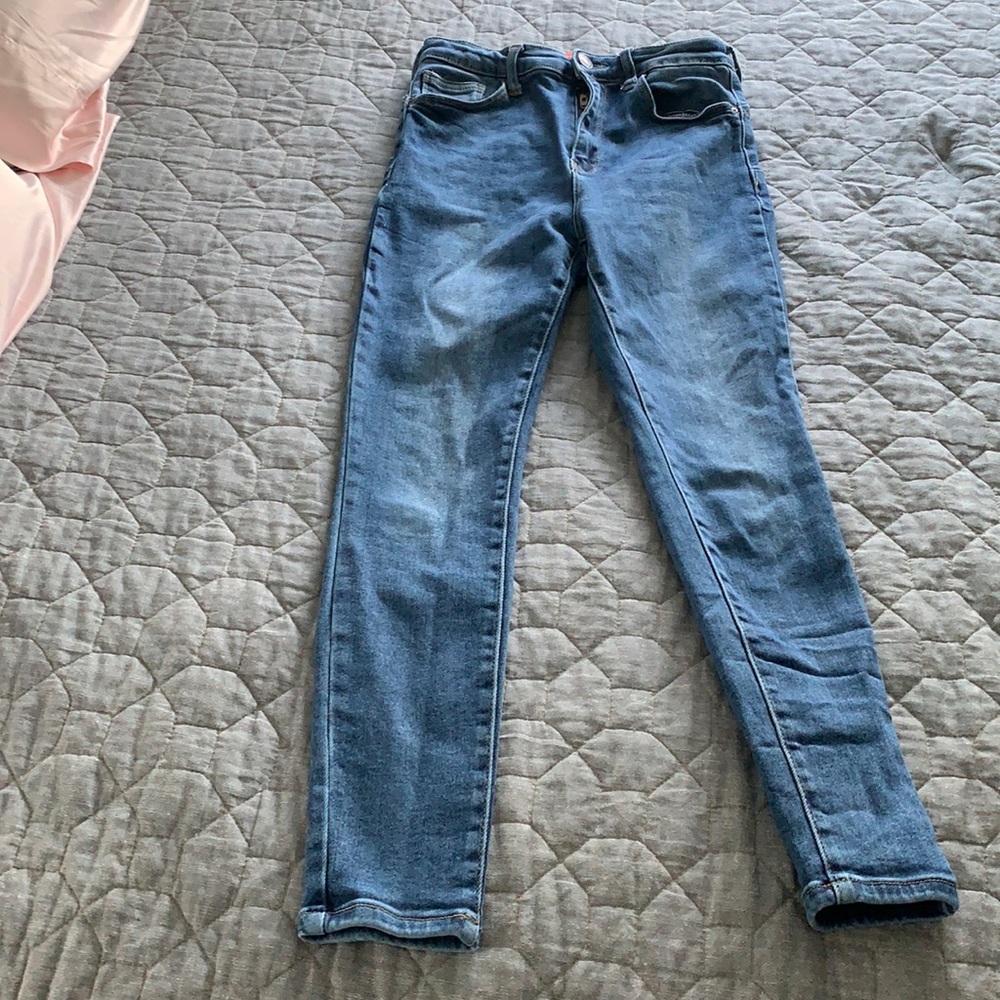 Wax skinny blue jeans